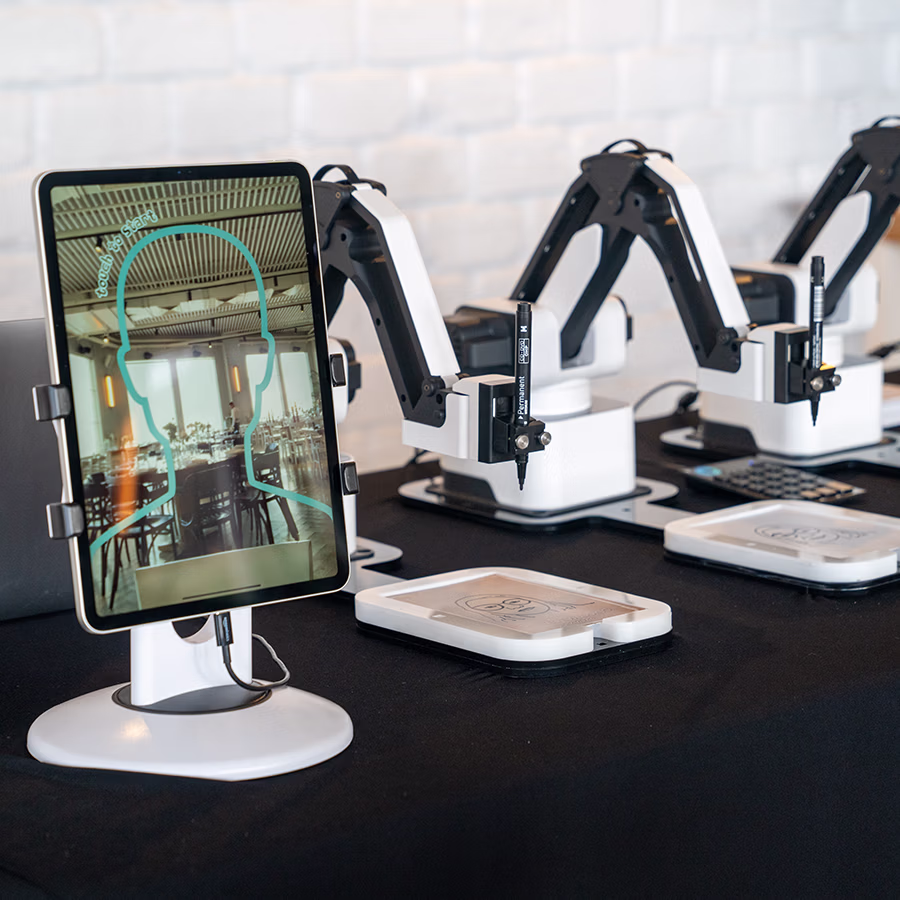 Draw Me Magic Photo Booth Rental Draw Me Bot iPad and Drawing Bots at an event