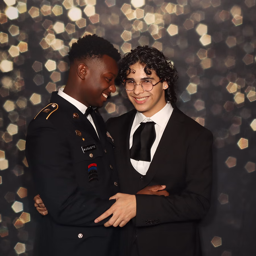 GGHS JR ROTC members embracing in their school events photo booth rental from Photo Magic Events