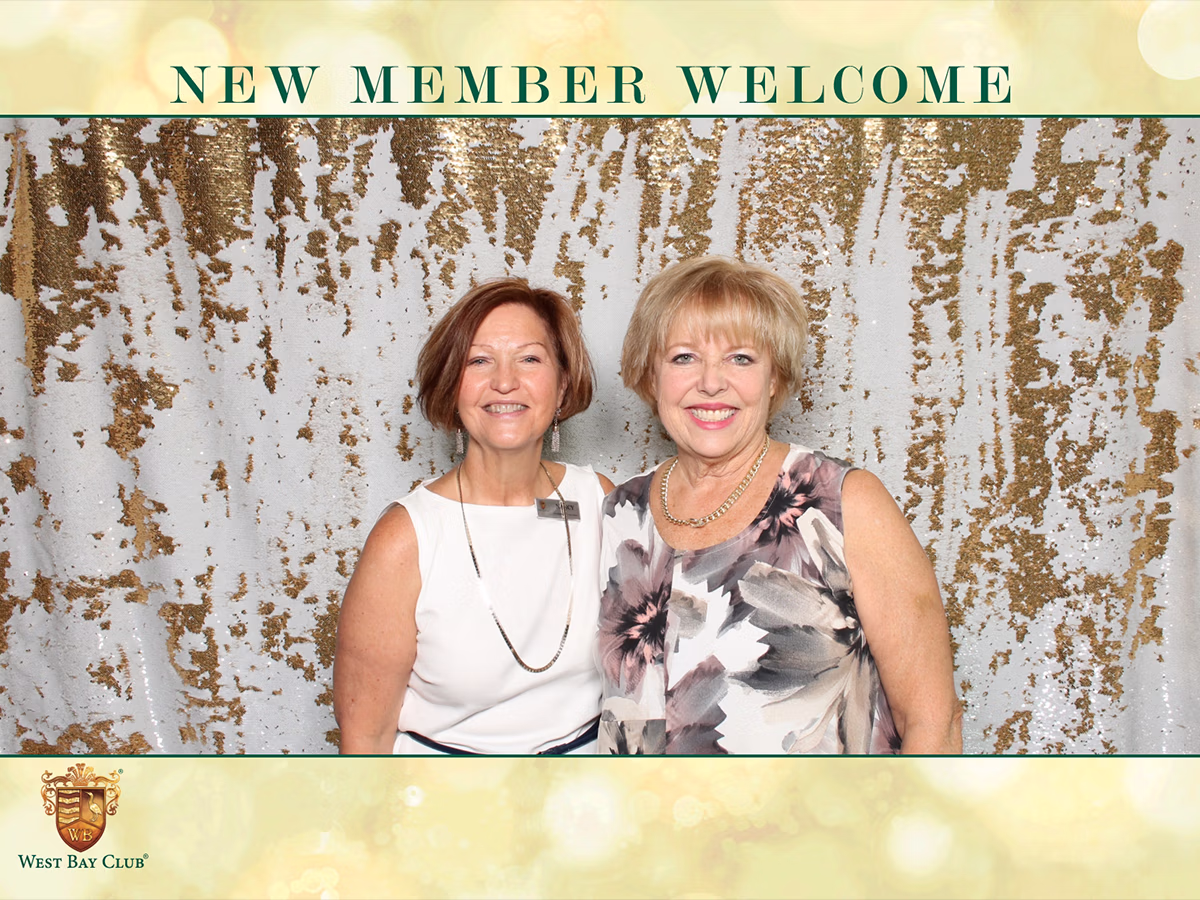 Photo Magic Events founder Deb Newman and associate at New Member Welcome party for the West Bay Club