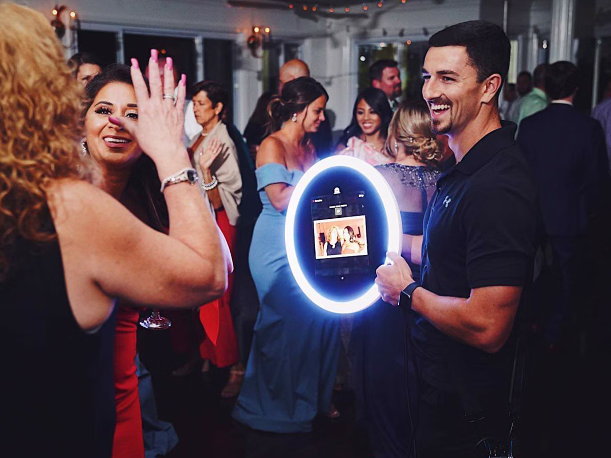 Roaming Magic Photo Booth Rental with Photo Magic Events attendant and guests