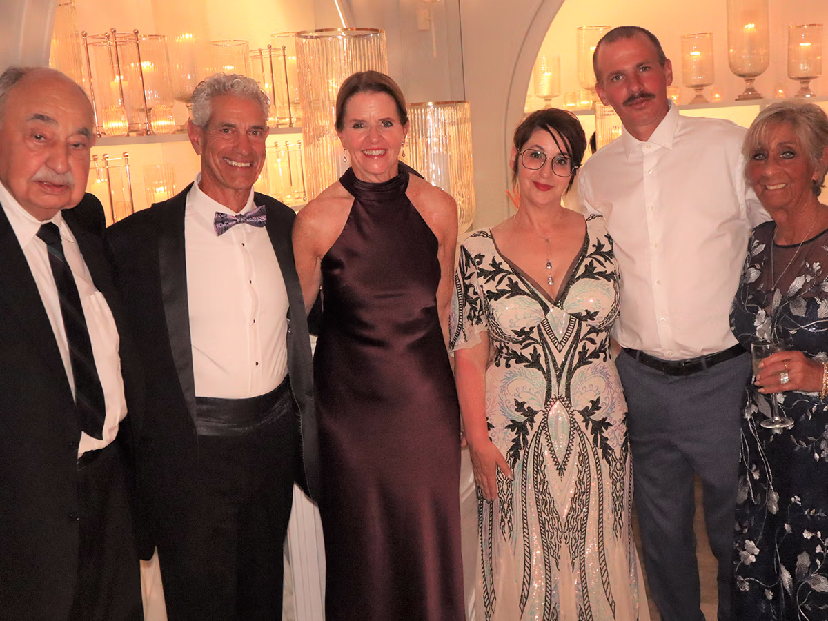 Roaming Magic Photo Booth Rentals capturing a family group at a wedding | Photo Magic Events