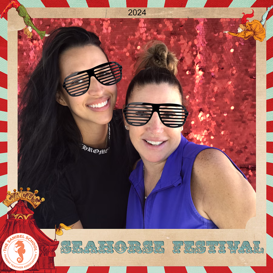 Two faculty members of The Sanibel School at the Seahorse Festival using the DIY Magic Photo Booth